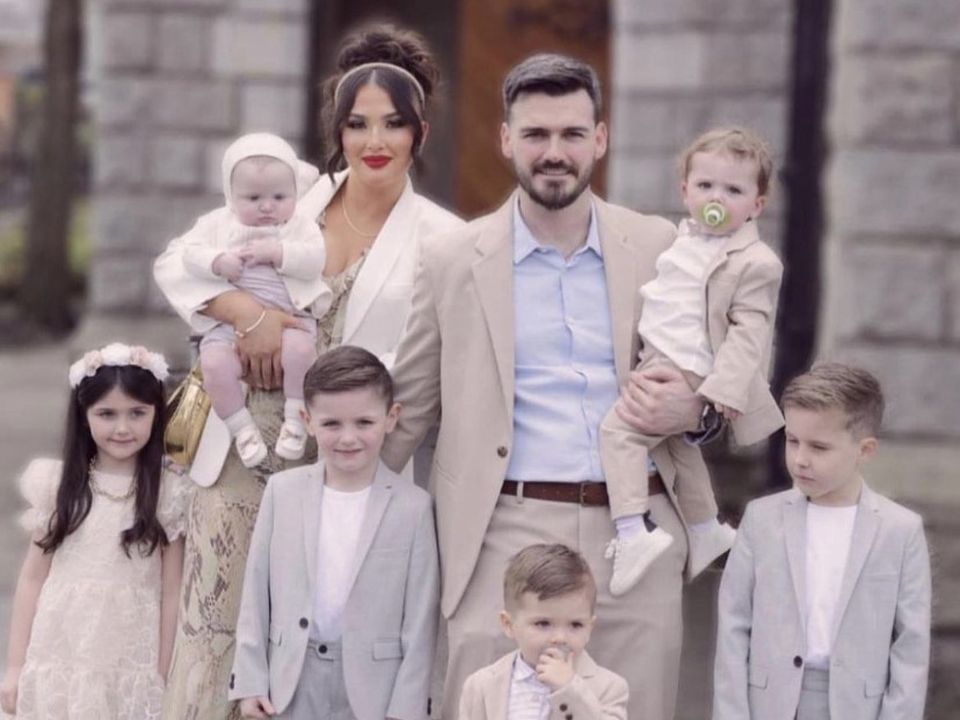 Gerard Jordan and partner Jo with their six children as they await the arrival of their seventh baby in January